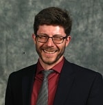 Dr. Joshua Revelle